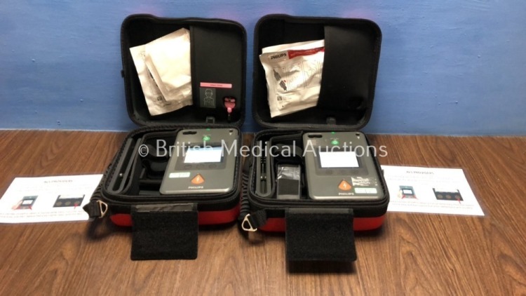 2 x Philips Heartstart FR3 Defibrillators with Batteries - Install Dates 2024-12 in Cases (Both Power Up) *C14F-01142 / C16E-01085*