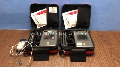 2 x Philips Heartstart FR3 Defibrillators in Cases with 1 x QCPR Meter (Both Power Up with Stock Battery - Not Included) *C16E-01077 / C14L-01596*