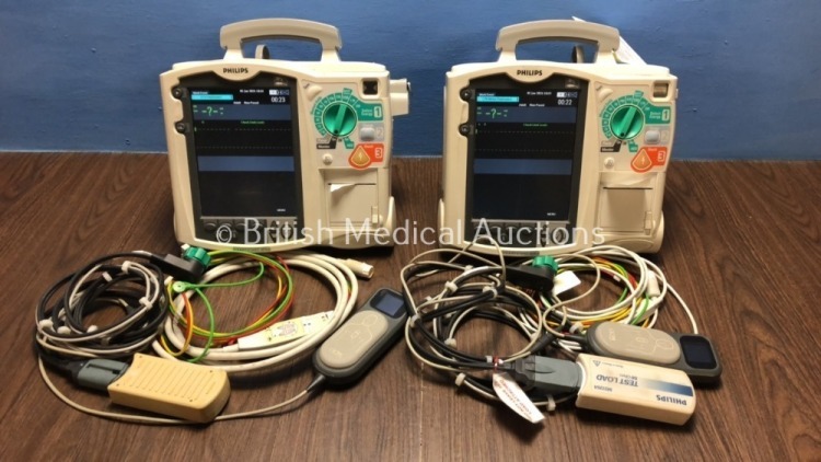 2 x Philips Heartstart MRx Defibrillators Including Pacer, ECG and Printer Option with 2 x Philips M3539A Batteries, 2 x Philips M3538 Module, 2 x Pad