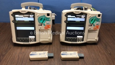 2 x Philips Heartstart MRx Defibrillators Including Pacer, ECG and Printer Options with 2 x Philips M3539A Batteries, 2 x Philips M3538 Module, 2 x Pa