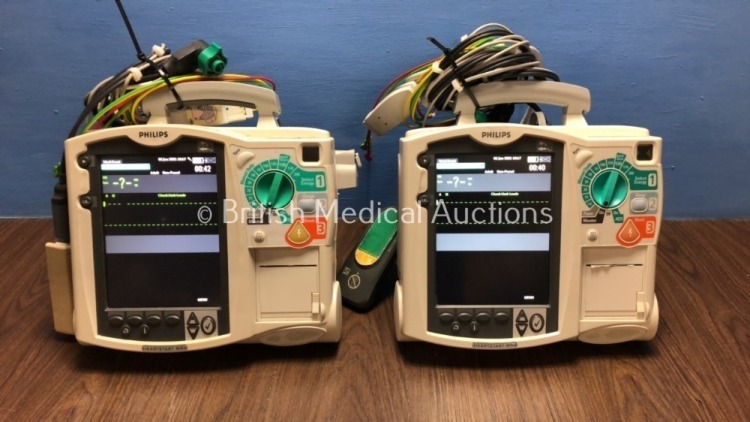 2 x Philips Heartstart MRx Defibrillators Including Pacer, ECG and Printer Option with 2 x Philips M3539A Batteries, 2 x Philips M3538 Module, 2 x Pad