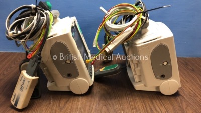 2 x Philips Heartstart MRx Defibrillators Including Pacer, ECG and Printer Option with 2 x Philips M3539A Batteries, 2 x Philips M3538 Module, 2 x Pad - 2