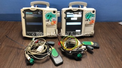2 x Philips Heartstart MRx Defibrillators Including Pacer, ECG and Printer Options with 2 x Philips M3539A Batteries, 2 x Philips M3538 Module, 2 x Pa