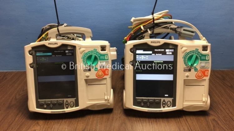 2 x Philips Heartstart MRx Defibrillators Including Pacer, ECG and Printer Option with 2 x Philips M3539A Batteries, 2 x Philips M3538 Module, 2 x Pad