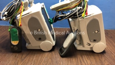 2 x Philips Heartstart MRx Defibrillators Including Pacer, ECG and Printer Option with 2 x Philips M3539A Batteries, 2 x Philips M3538 Module, 2 x Pad - 2