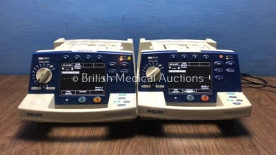 2 x Philips HeartStart XL Smart Biphasic Defibrillators with Pacer,ECG and Printer Options (Both Power Up) * SN US00451211 / US00594782 *