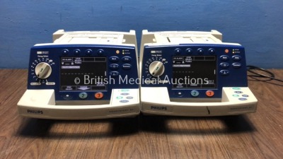 2 x Philips HeartStart XL Smart Biphasic Defibrillators with Pacer,ECG and Printer Options (Both Power Up) * SN US00443823 / US00461682 *