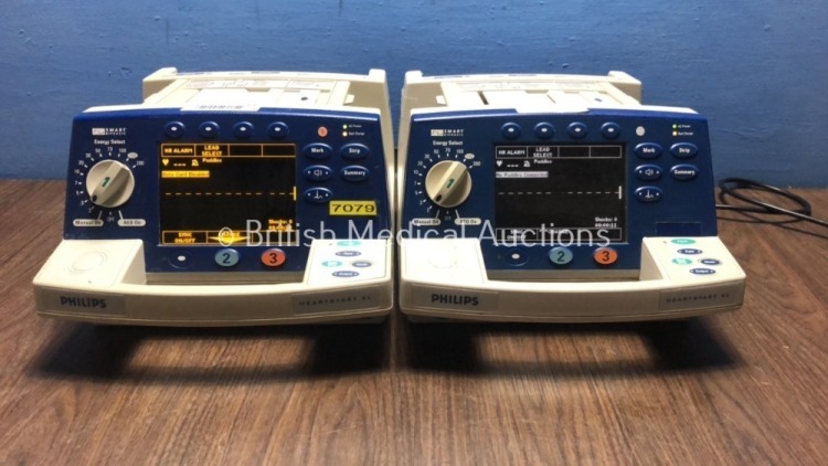 2 x Philips HeartStart XL Smart Biphasic Defibrillators with Pacer,ECG and Printer Options (Both Power Up) * SN US00445251 / US00122002 *