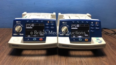2 x Philips HeartStart XL Smart Biphasic Defibrillators with Pacer,ECG and Printer Options (Both Power Up) * SN US00936709 / US00443835 *
