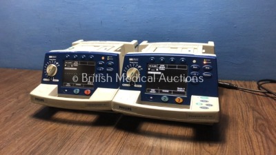 2 x Philips HeartStart XL Smart Biphasic Defibrillators with Pacer,ECG and Printer Options (Both Power Up) * SN US00936709 / US00443835 * - 2