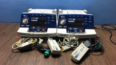 2 x Philips HeartStart XL Smart Biphasic Defibrillators with ECG and Printer Options,2 x Paddle Leads,2 x Philips Test Loads and 2 x 3-Lead ECG Leads