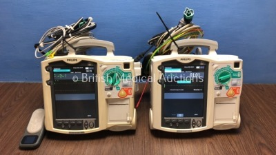 2 x Philips Heartstart MRx Defibrillators Including Pacer, ECG and Printer Option with 2 x Philips M3539A Batteries, 2 x Philips M3538 Module, 2 x Pad