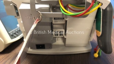 2 x Philips Heartstart MRx Defibrillators Including Pacer, ECG and Printer Option with 2 x Philips M3539A Batteries, 2 x Philips M3538 Module, 2 x Pad - 5