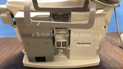 2 x Philips Heartstart MRx Defibrillators Including Pacer, ECG and Printer Option with 2 x Philips M3539A Batteries, 2 x Philips M3538 Module, 2 x Pad - 6