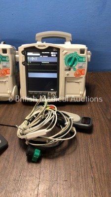 2 x Philips Heartstart MRx Defibrillators Including Pacer, ECG and Printer Options with 2 x Philips M3539A Batteries, 2 x Philips M3538 Module, 2 x Pa - 3