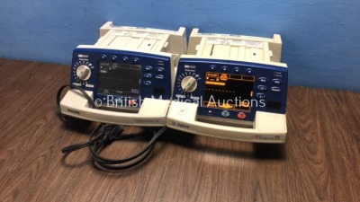 1 x Philips HeartStart XL Smart Biphasic Defibrillator with ECG and Printer Options and 1 x Agilent Heartstream XL Smart Biphasic Defibrillator with E - 2