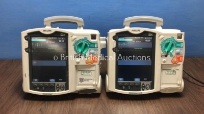 2 x Philips HeartStart MRx Defibrillators with BP1,BP2,NBP,ECG,SpO2,Temp and CO2 Options,2 x Modules and 2 x Batteries (Both Power Up-1 x Damage to Sc