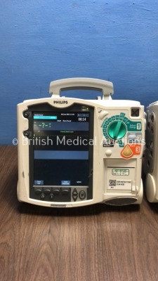 2 x Philips HeartStart MRx Defibrillators with BP1,BP2,NBP,ECG,SpO2,Temp and CO2 Options,2 x Modules and 2 x Batteries (Both Power Up-1 x Damage to Sc - 2