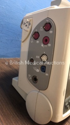 2 x Philips HeartStart MRx Defibrillators with BP1,BP2,NBP,ECG,SpO2,Temp and CO2 Options,2 x Modules and 2 x Batteries (Both Power Up-1 x Damage to Sc - 3