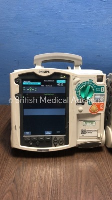 2 x Philips HeartStart MRx Defibrillators with BP1,BP2,NBP,ECG,SpO2,Temp and CO2 Options,2 x Modules and 2 x Batteries (Both Power Up-1 x Damage to Sc - 7