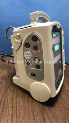 2 x Philips HeartStart MRx Defibrillators with BP1,BP2,NBP,ECG,SpO2,Temp and CO2 Options,2 x Modules and 2 x Batteries (Both Power Up-1 x Damage to Sc - 10