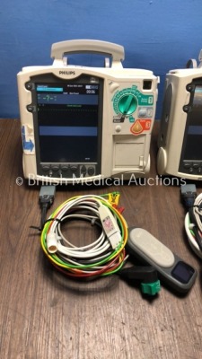 2 x Philips Heartstart MRx Defibrillators Including Pacer, ECG and Printer Options with 2 x Philips M3539A Batteries, 2 x Philips M3538 Module, 2 x Pa - 2