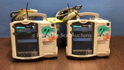 2 x Philips Heartstart MRx Defibrillators Including Pacer, ECG and Printer Option with 2 x Philips M3539A Batteries, 2 x Philips M3538 Module, 2 x Pad