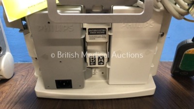 2 x Philips Heartstart MRx Defibrillators Including Pacer, ECG and Printer Option with 2 x Philips M3539A Batteries, 2 x Philips M3538 Module, 2 x Pad - 3