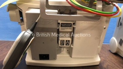 2 x Philips Heartstart MRx Defibrillators Including Pacer, ECG and Printer Option with 2 x Philips M3539A Batteries, 2 x Philips M3538 Module, 2 x Pad - 4