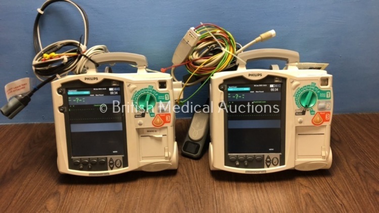 2 x Philips Heartstart MRx Defibrillators Including Pacer, ECG and Printer Option with 2 x Philips M3539A Batteries, 2 x Philips M3538 Module, 2 x Pad