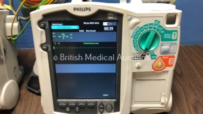 2 x Philips Heartstart MRx Defibrillators Including Pacer, ECG and Printer Option with 2 x Philips M3539A Batteries, 2 x Philips M3538 Module, 2 x Pad - 2