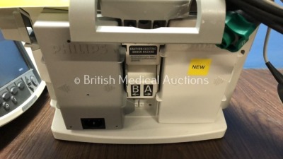 2 x Philips Heartstart MRx Defibrillators Including Pacer, ECG and Printer Option with 2 x Philips M3539A Batteries, 2 x Philips M3538 Module, 2 x Pad - 5