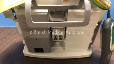 2 x Philips Heartstart MRx Defibrillators Including Pacer, ECG and Printer Option with 2 x Philips M3539A Batteries, 2 x Philips M3538 Module, 2 x Pad - 6