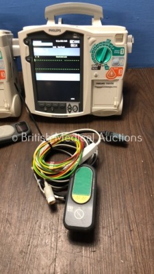 2 x Philips Heartstart MRx Defibrillators Including Pacer, ECG and Printer Option with 2 x Philips M3539A Batteries, 2 x Philips M3538 Module, 2 x Pad - 2