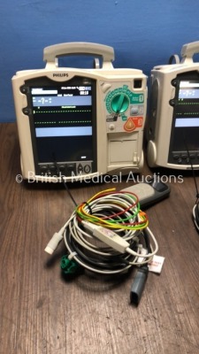 2 x Philips Heartstart MRx Defibrillators Including Pacer, ECG and Printer Option with 2 x Philips M3539A Batteries, 2 x Philips M3538 Module, 2 x Pad - 3