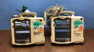 2 x Philips Heartstart MRx Defibrillators Including Pacer, ECG and Printer Option with 2 x Philips M3539A Batteries, 2 x Philips M3538 Module, 2 x Pad