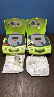 2 x Zoll AED Plus Defibrillators with Pads (Both Power Up - 1 x Good Battery Included) *S/N X05E059862 / X05E061009* (s)
