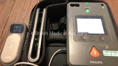 2 x Philips Heartstart FR3 Defibrillators in Cases with 1 x Battery and 2 x QCPR Meters (Both Power Up) *C16E-01078 / C14F-01177* (H) - 2