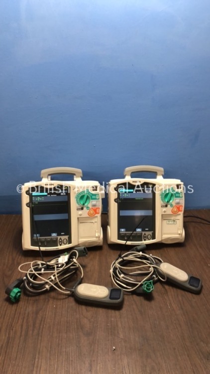 2 x Philips Heartstart MRx Defibrillators Including Pacer, ECG and Printer Options, 1 x with CO2 Option with 2 x Philips M3539A Batteries, 2 x Philips