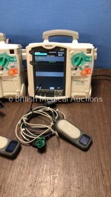 2 x Philips Heartstart MRx Defibrillators Including Pacer, ECG and Printer Options, 1 x with CO2 Option with 2 x Philips M3539A Batteries, 2 x Philips - 3