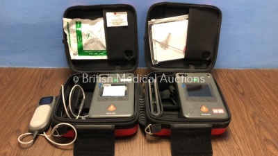 2 x Philips Heartstart FR3 Defibrillators in Cases with 1 x Battery and 1 x QCPR Meter (Both Power Up) *C16C-00106 / C13L-00518* (H)