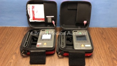 2 x Philips Heartstart FR3 Defibrillators in Cases with 1 x Battery (Both Power Up) *C14L-01566 / C13L-00528* (H)