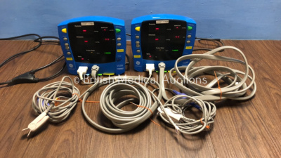 2 x GE Carescape Dinamap V100 Patient Monitors with 2 x Power Supplies, 2 x BP Hoses and 2 x SpO2 Finger Sensors (Both Power Up)