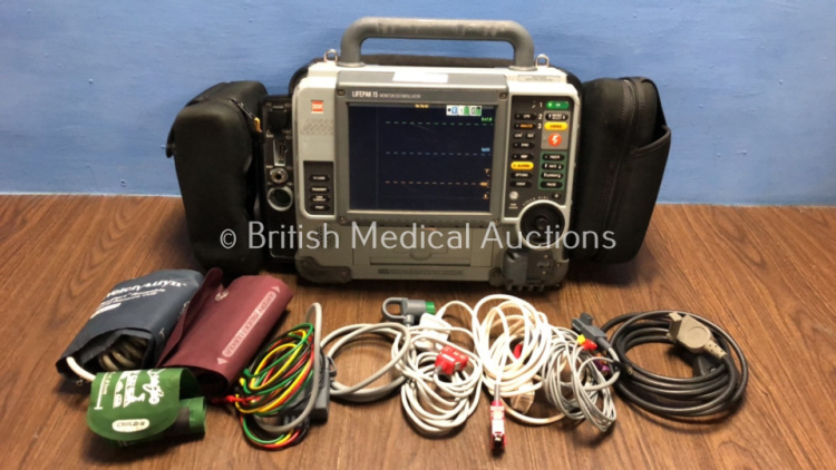 Medtronic Physio-Control Lifepak 15 12-Lead Monitor / Defibrillator *Mfd - 2010* Ref - 99577-000025 P/N - V15-2-000030 Software Version - 3207410-007 with Pacer, CO2, SPO2, NIBP, ECG and Printer Options, 4 and 6 Lead ECG Leads, SPO2 Finger Sensor, NIBP Cu