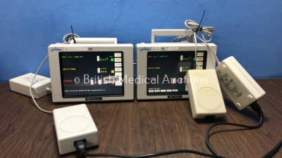 2 x Spacelabs Medical 90369 Patient Monitors Including ECG, P1-2, SpO2, T1-2, hlo1, hlo2 and NIBP Options (Both Power Up)