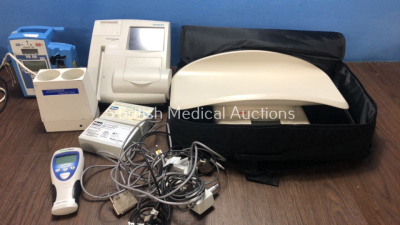 Mixed Lot Including 1 x Alaris SE Pump (Powers Up) 1 x Sonarwarm Diagnostic Sensor (Powers Up) 1 x Siemens DCA Vantage Analyzer (Untested Due to No Power Supply) 1 x Welch Allyn SureTemp Plus Thermometer (No Power, Missing Probe-See Photo) 2 x FMS Hand Co