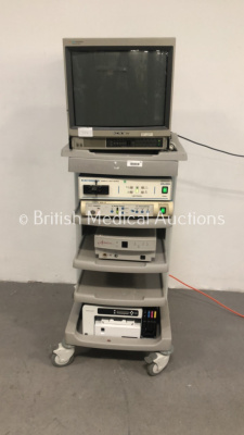 Storz Stack Trolley with Sony Trinitron Monitor, Smith and Nephew Dyonics Xenon XL Light Source, Smith and Nephew Dyonics ED-3 Enhanced Digital 3-Chip Camera Control Unit, Arthrocare System 2000 Controller and Ricoh Printer (Powers Up)