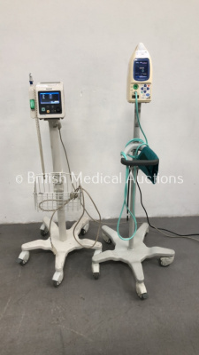 1 x Philips SureSigns VS2+ Patient Monitor on Stand and 1 x Fukuda Denshi PetiTelemo DS-7100 Patient Monitor on Stand with BP Hose (Both Power Up)