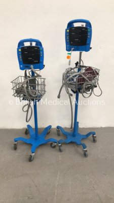 1 x GE Carescape Vital Signs Monitor on Stand with BP Hose and SPO2 Finger Sensor and 1 x GE ProCare Auscultatory 300 Vital Signs Monitor on Stand with SPO2 Finger Sensor, BP Hose and Cuff (Both No Power)