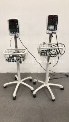 1 x InterMed Penlon VS-800 Vital Signs Monitor on Stand with SPO2 Finger Sensor and BP Hose and 1 x Mindray VS-800 Vital Signs Monitor on Stand with SPO2 Finger Sensor and BP Hose (Both Power Up)